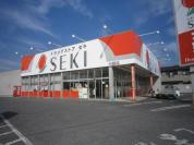 ドラッグストアセキ川間店