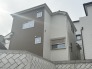 6号棟 コントラストが美しい外壁と、幾何学模様の石積みが印象的な邸宅。洗練されたデザインが、穏やかな毎日を演出します
