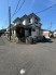 角地に位置し、周囲に圧迫感のない開放的な住環境。ゆとりを感じさせる端正な外観です
